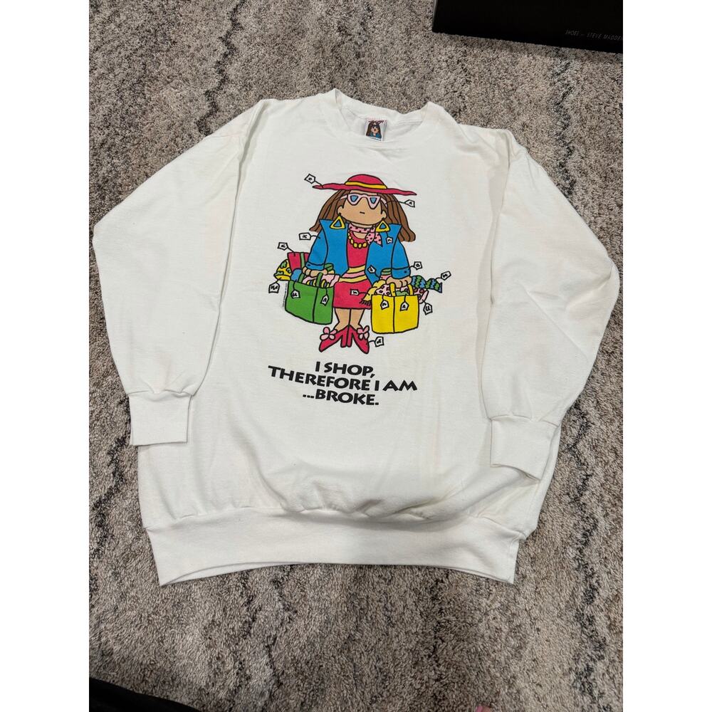 white crewneck sweatshirt is a vintage Chic Cathy by Creative Mills graphic